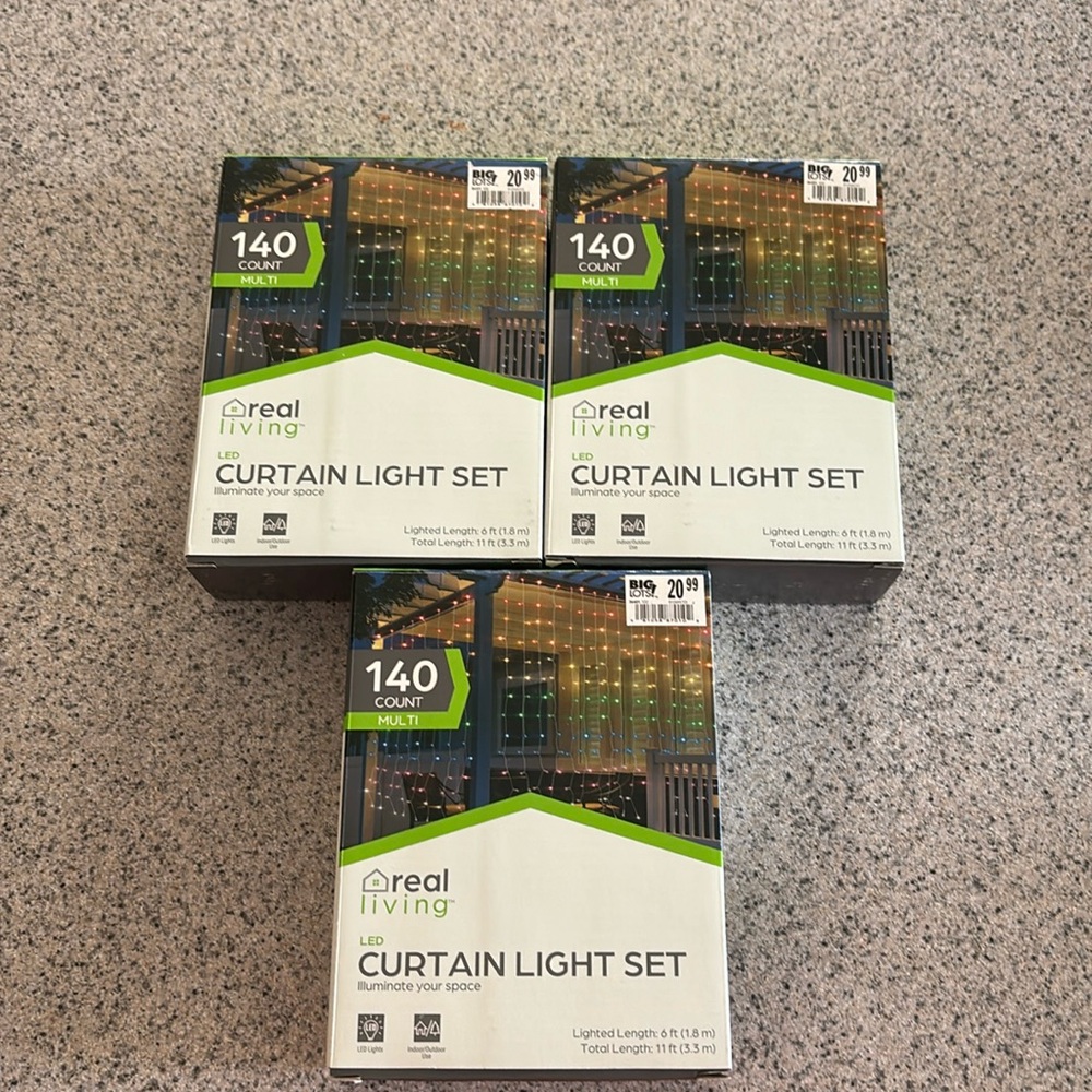 Multi-Color LED Curtain Light Set

with White Wire, 140-Lights new boxes